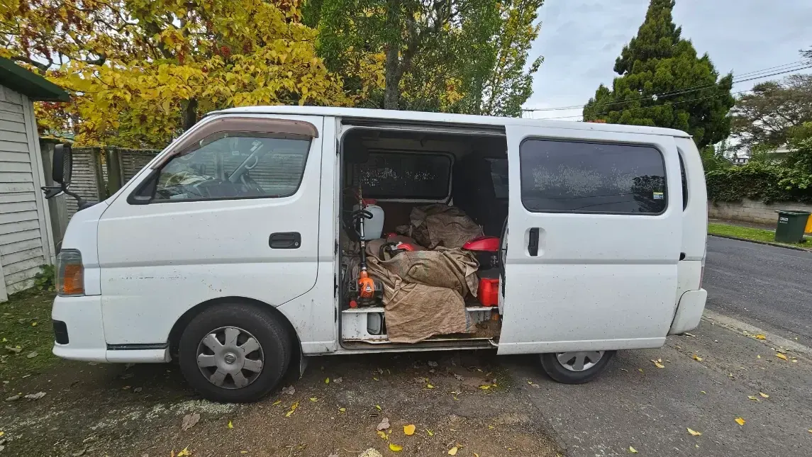 A lawn mowing van all tooled up