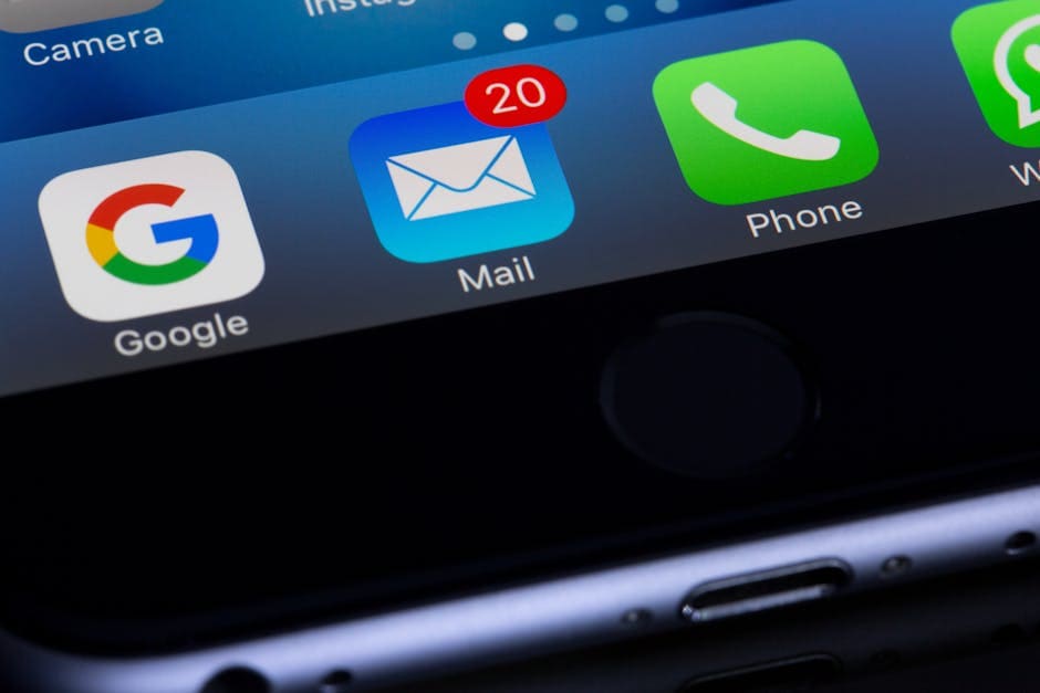 pexels-photo-193003-193003 A close-up photo of a smartphone displaying popular apps like Google and Mail.