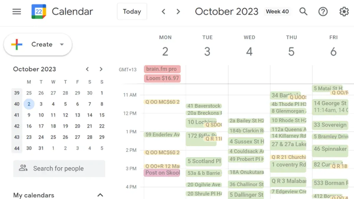 Stuart's Google Calendar for a week in October 2023, with each lawn booked as a green appointment by street address and quotes marked in yellow