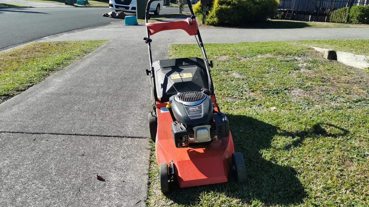 Mower on the driveway ready for the next job